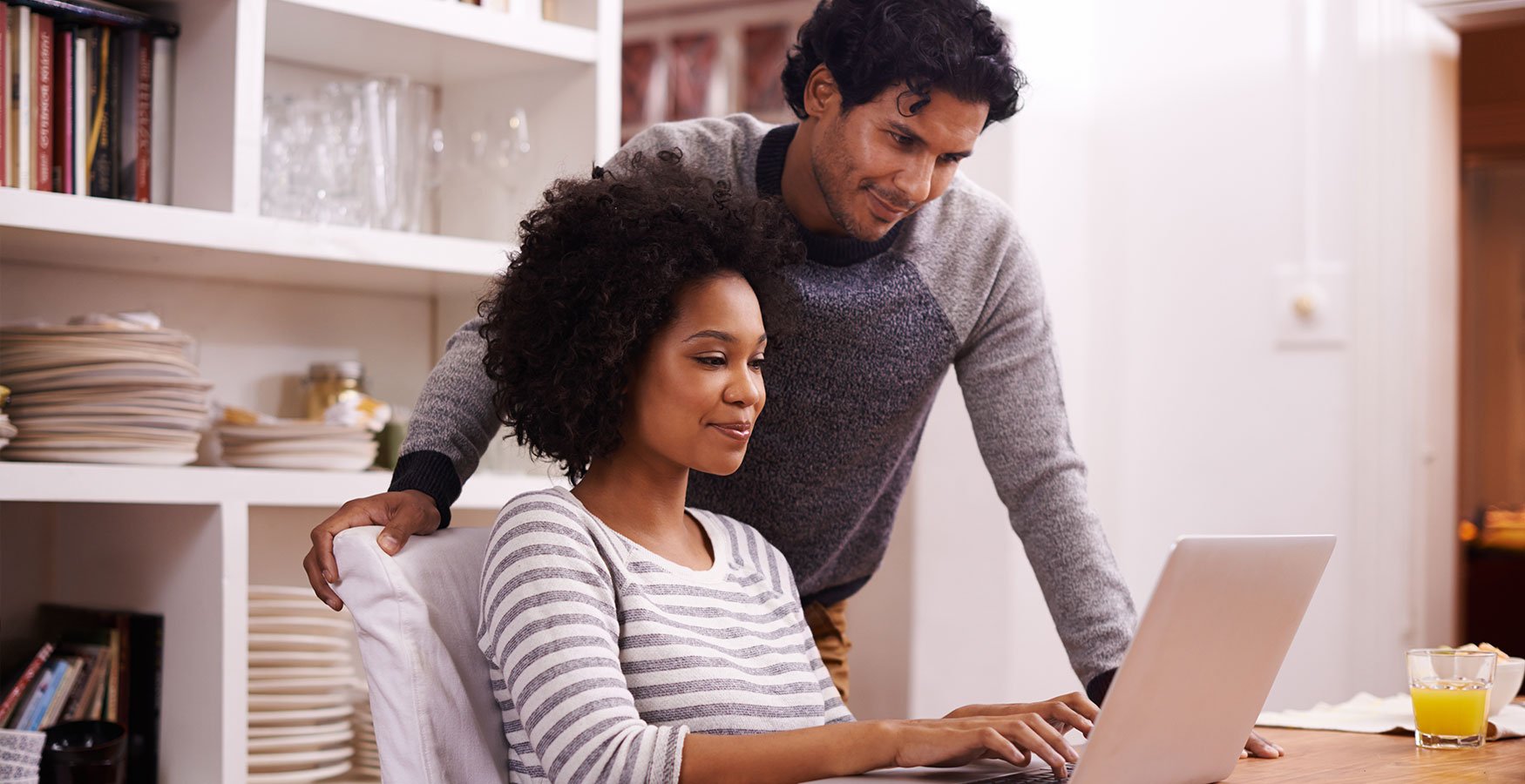 Couple looking at laptop