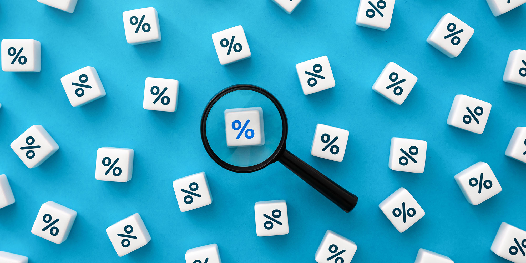 magnifying glass looks at percentages