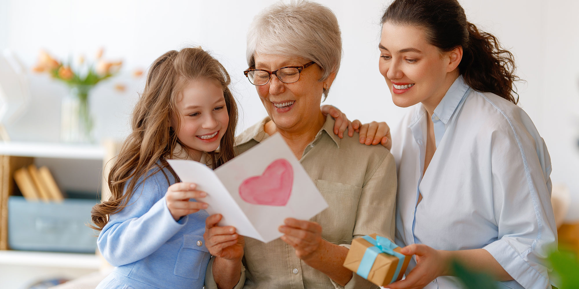 family giving to grandmother