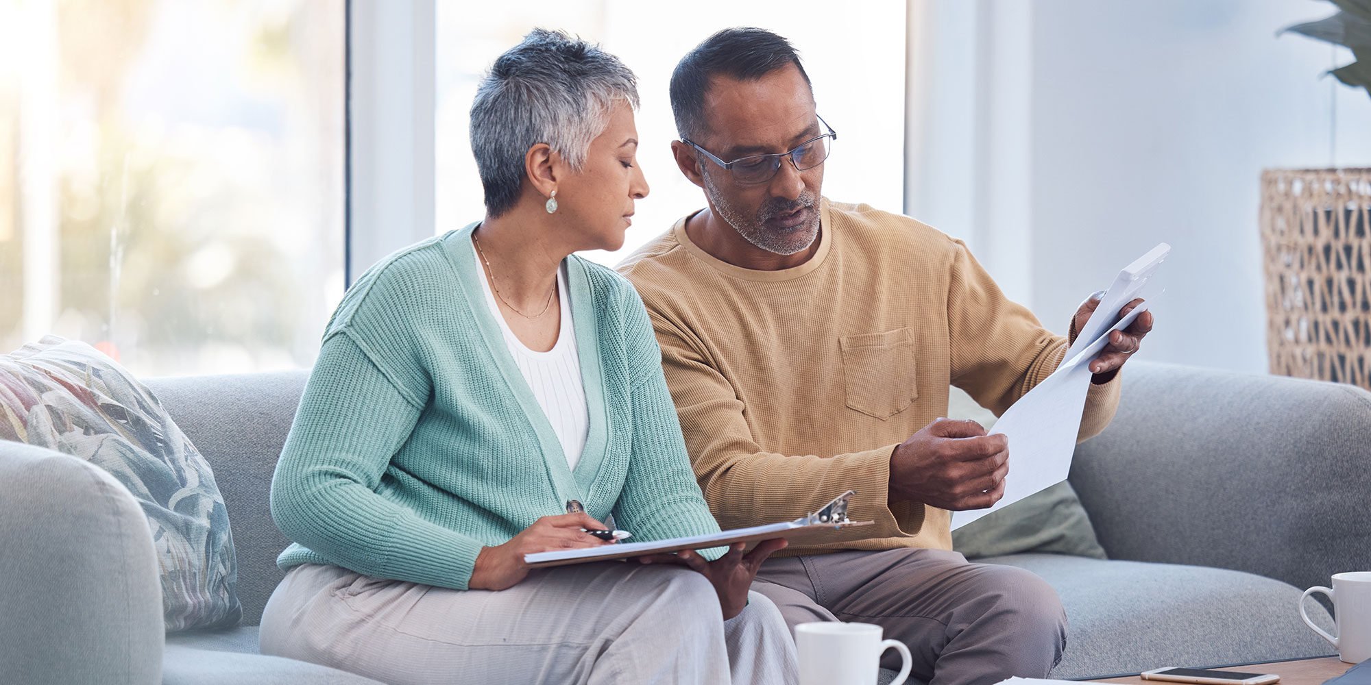 Older couple reviewing their financial goals.