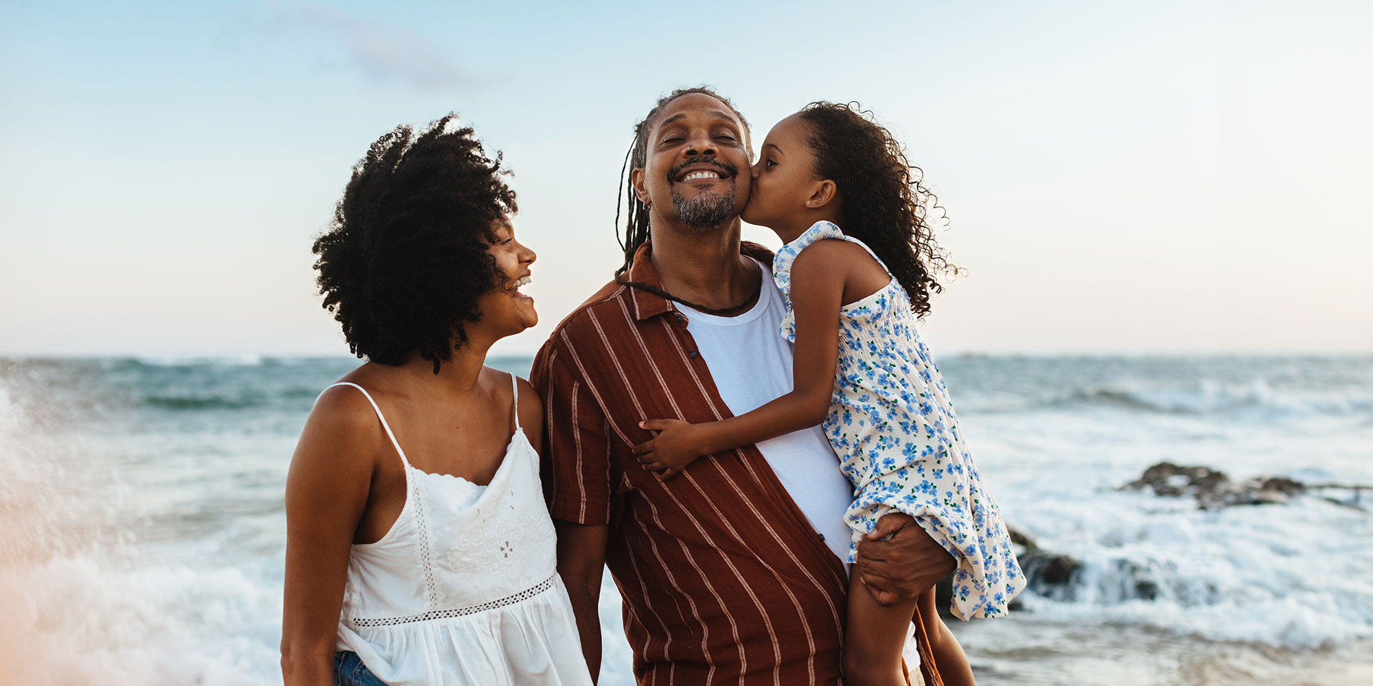 Happy family at the beach.
