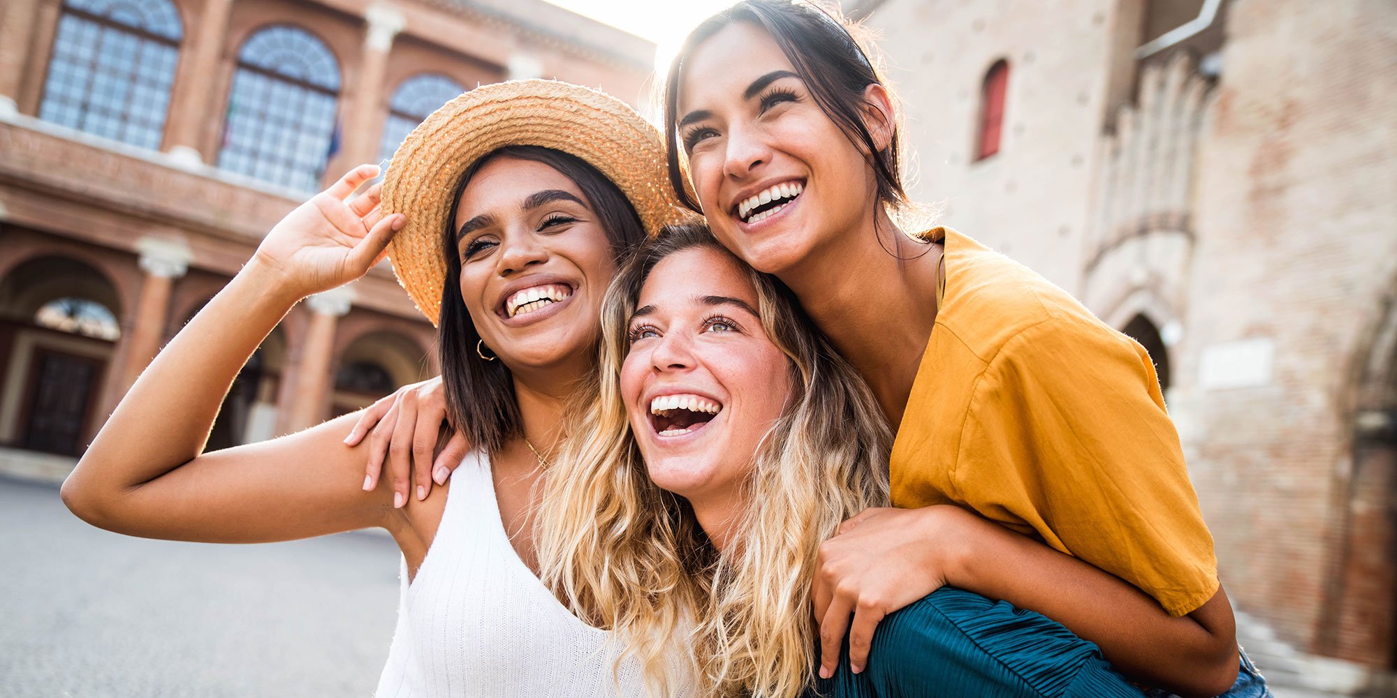 Group of girl friends laughing together. 