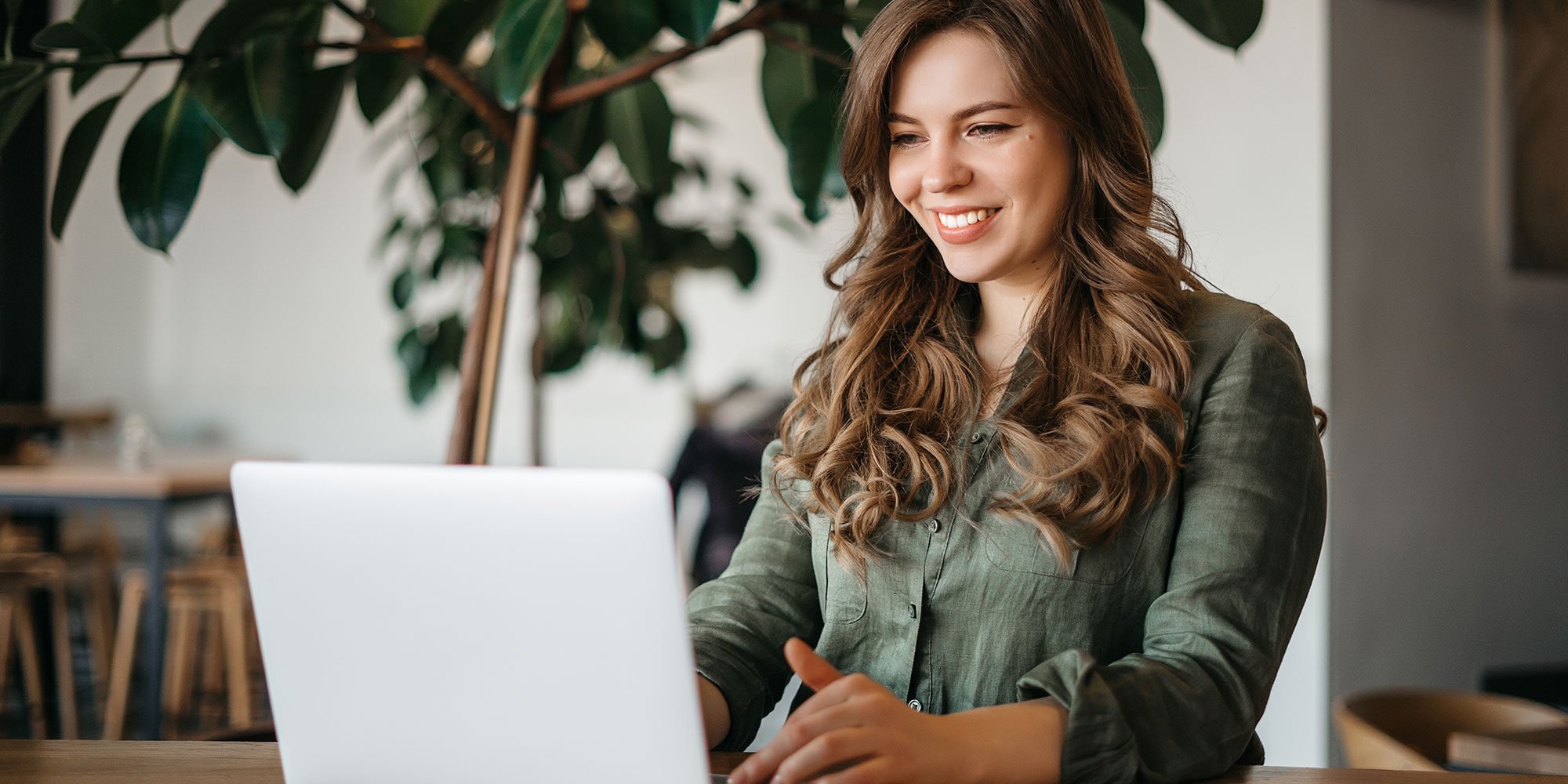 Woman looking at her laptop.